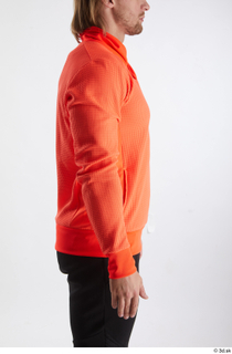 Erling  1 arm dressed flexing orange long sleeve t…